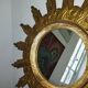 Miroir soleil bois sculpté doré