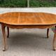Round extendable dining table Louis XV in solid wood from the 1960s.