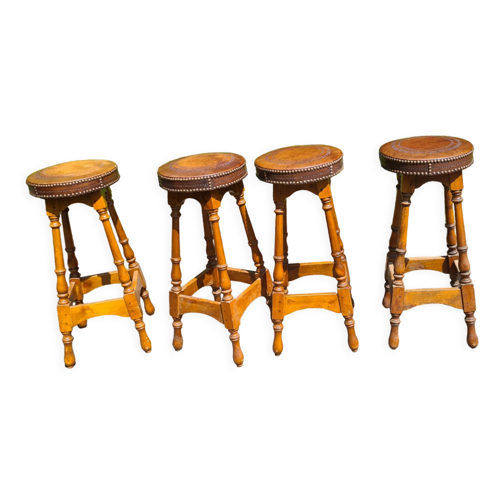 4 old leather and wood stools