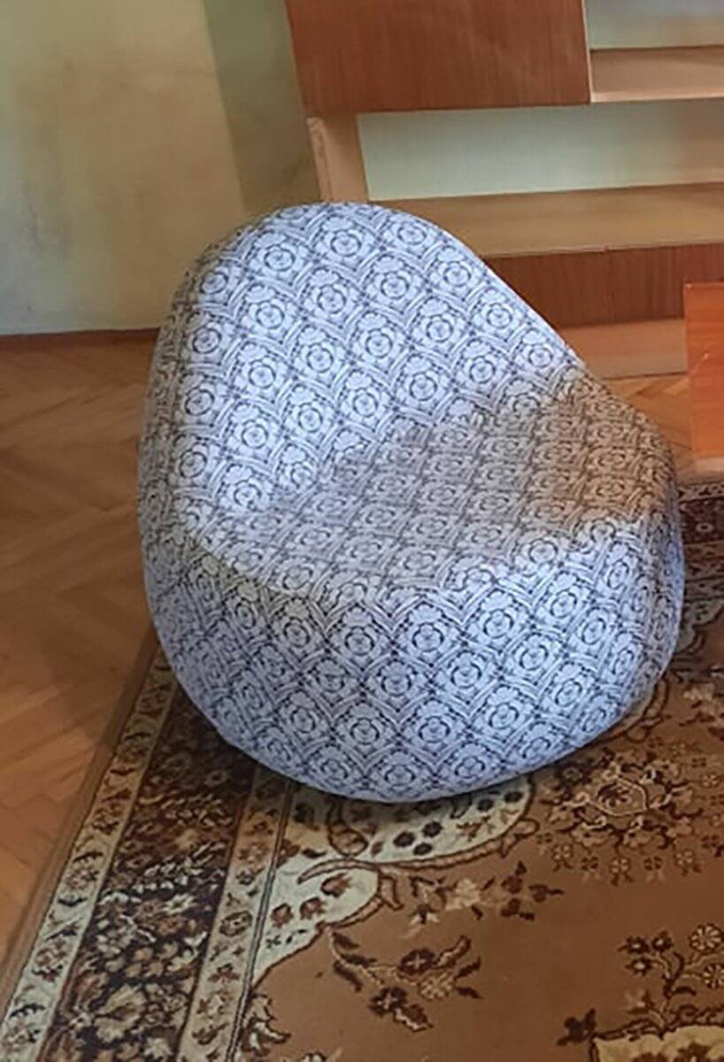 1970s vintage armchair in multicoloured patterned fabric, rounded silhouette