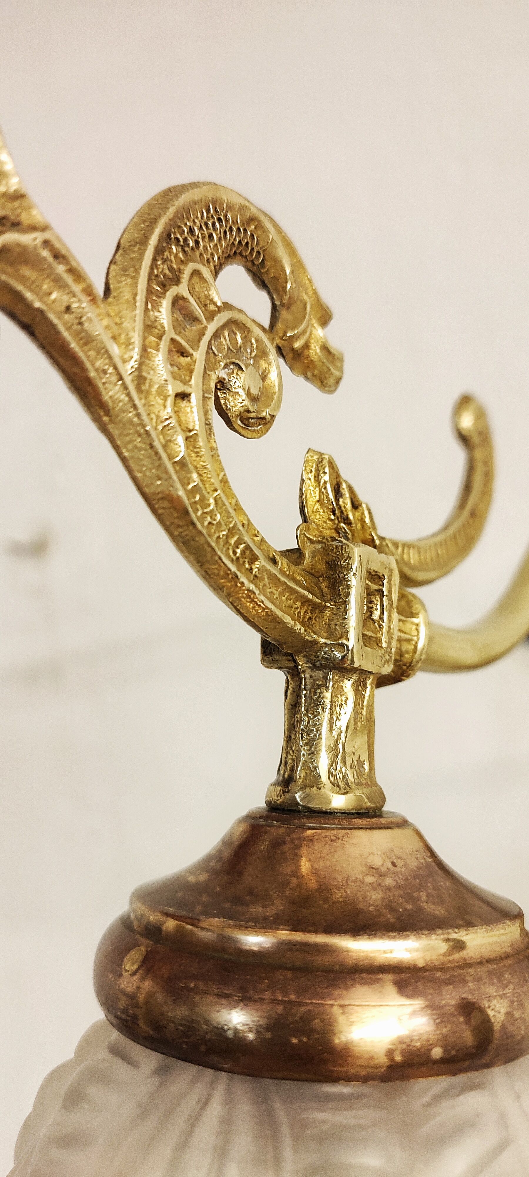 Bronze Modernist wall lamp. Spain, 1930s.