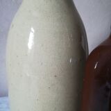 2 sandstone bottles