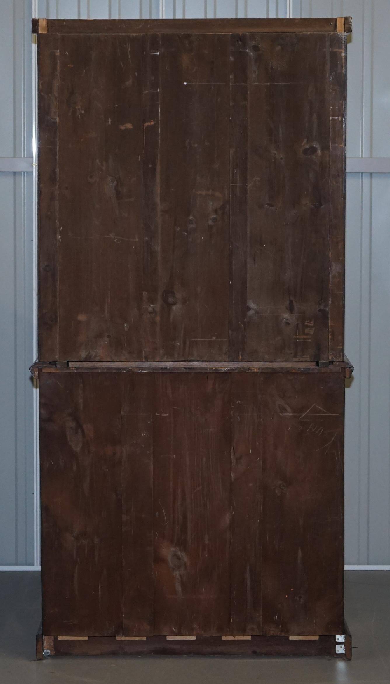 Light wood library with a secretary and leather surface.
