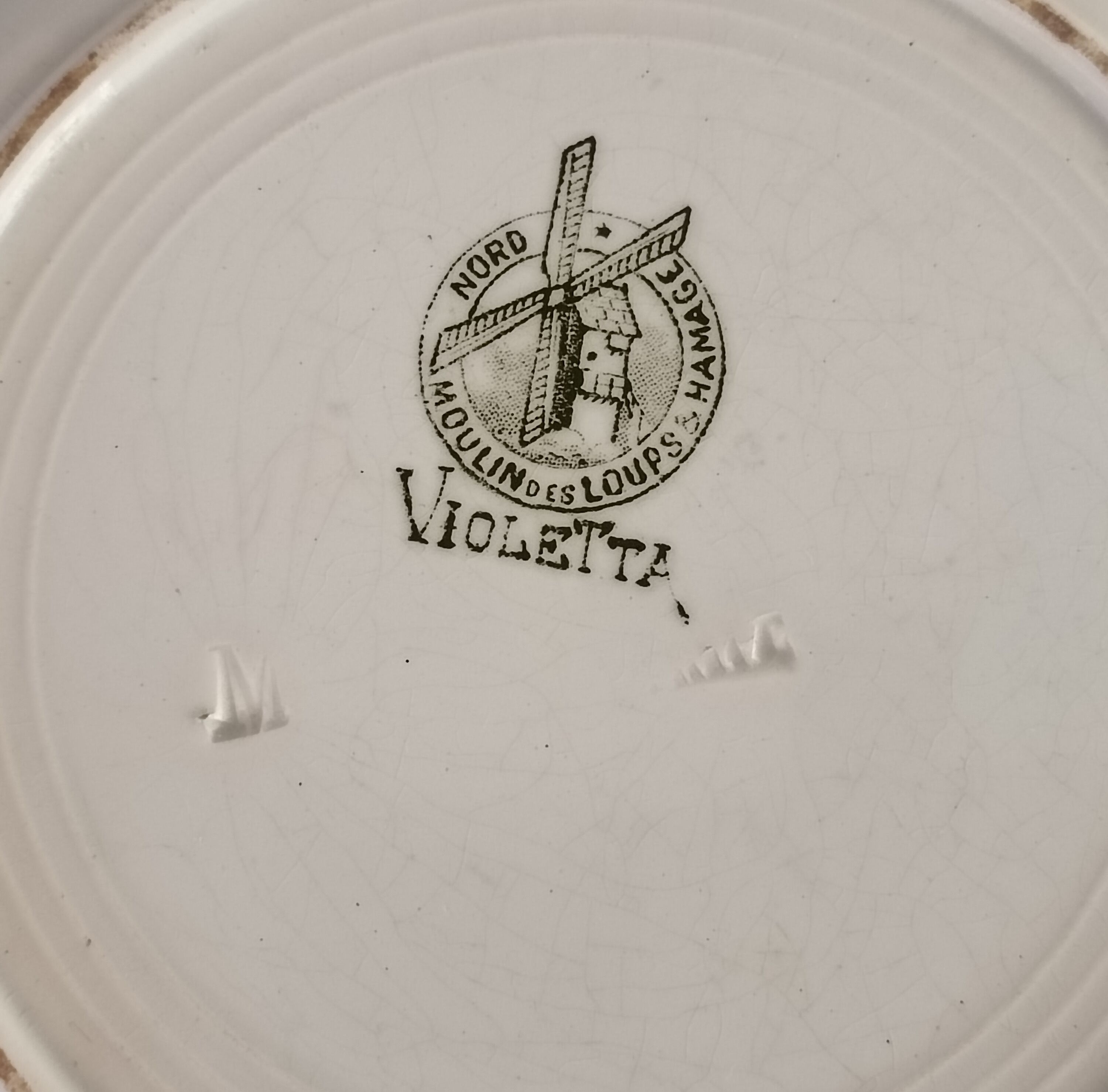 2 hollow plates in iron earth Moulin des Loups and Hamage