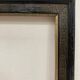 Black and gold frame decorated with Greek frieze decoration