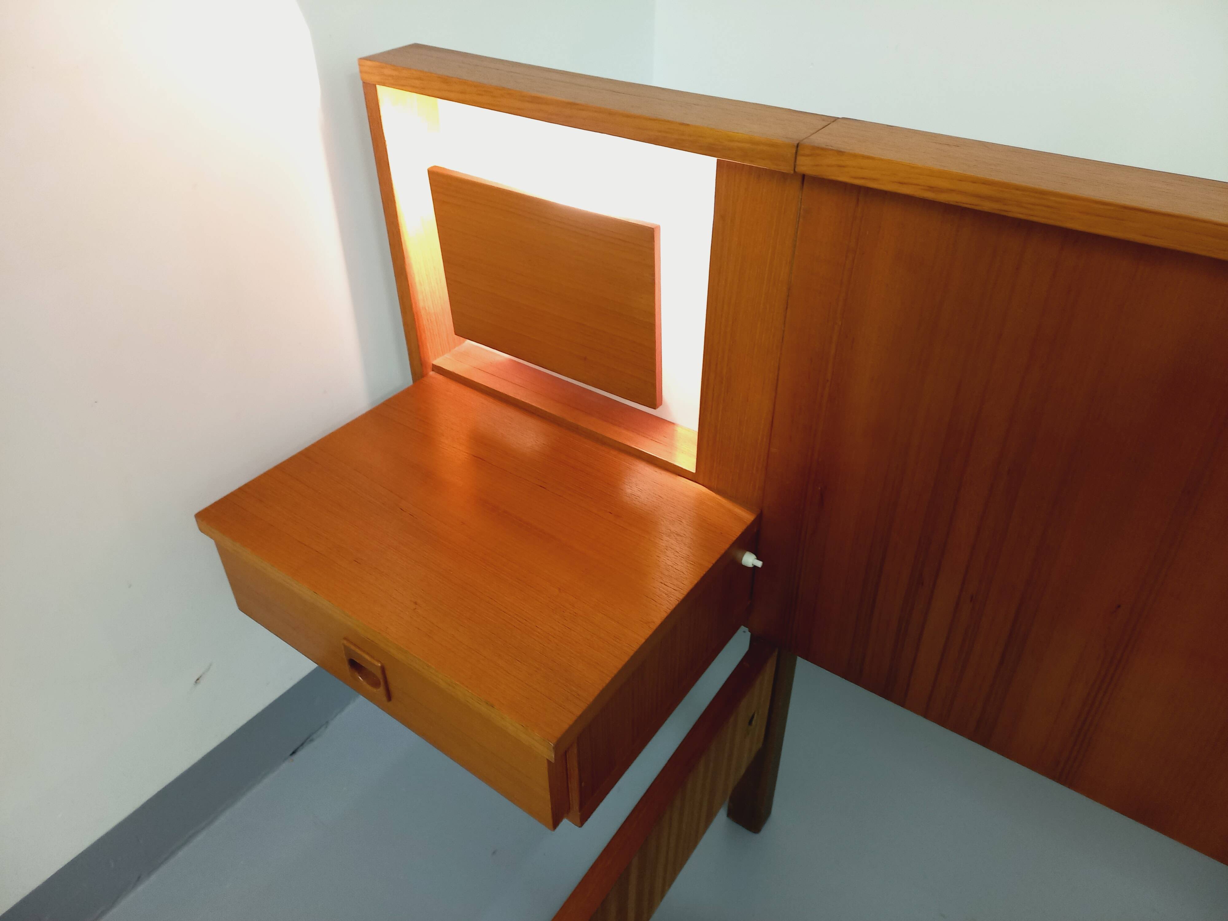 Vintage Scandinavian style double bed in teak from the 60s with integrated bedside lights