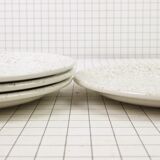 Four Ceraminter dessert plates