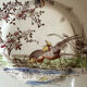 Polychrome ironstone dessert plates from Digoin and Sarreguemines.