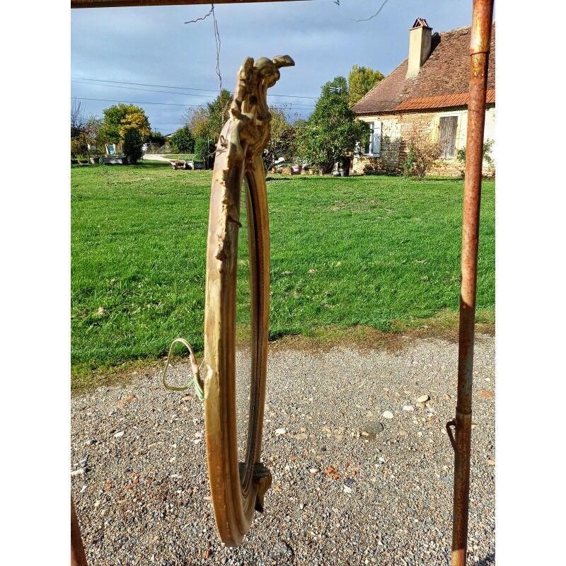 Miroir ovale en bois et stuc doré 19ème