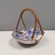 Beautiful small painted ceramic basket with woven handle