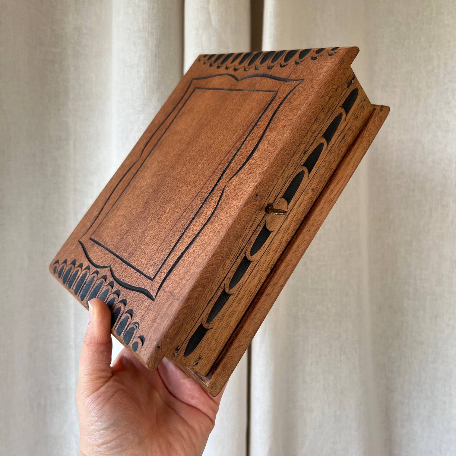 Carved wooden box with key