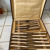 Box of silver metal knives