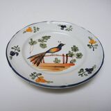 Old ceramic plate, hand-decorated, signed: bird on a fence.