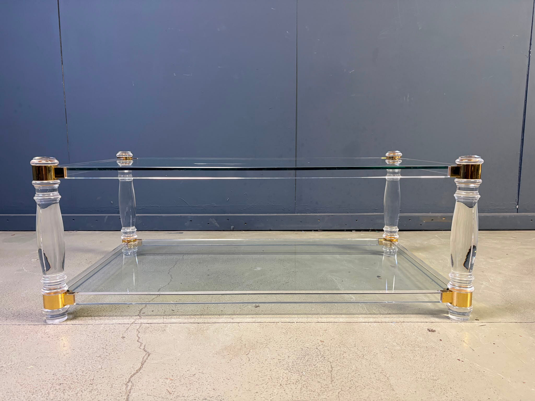 Vintage lucite and brass coffee table, 1970s