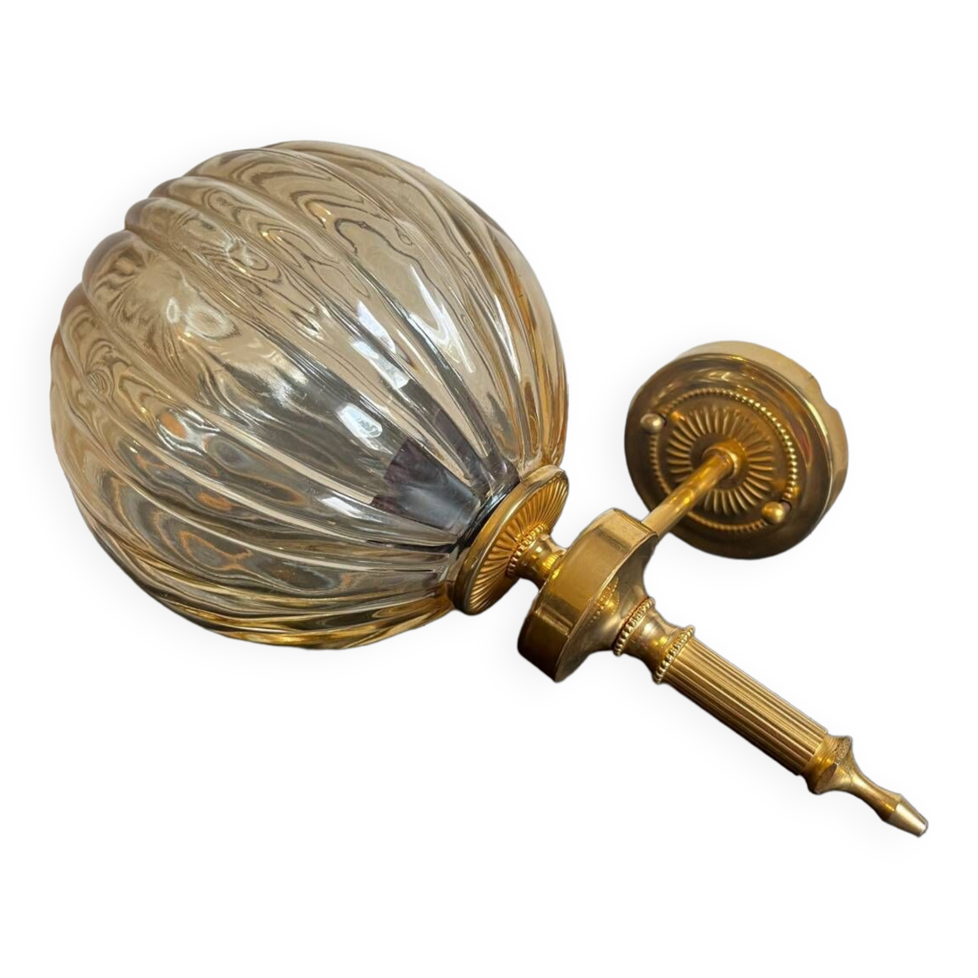 Brass wall light and bubbled glass globe