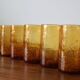Set of 6 amber, blown and bubbled Biot glasses