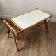 Tabler basse en rotin avec porte-revues
