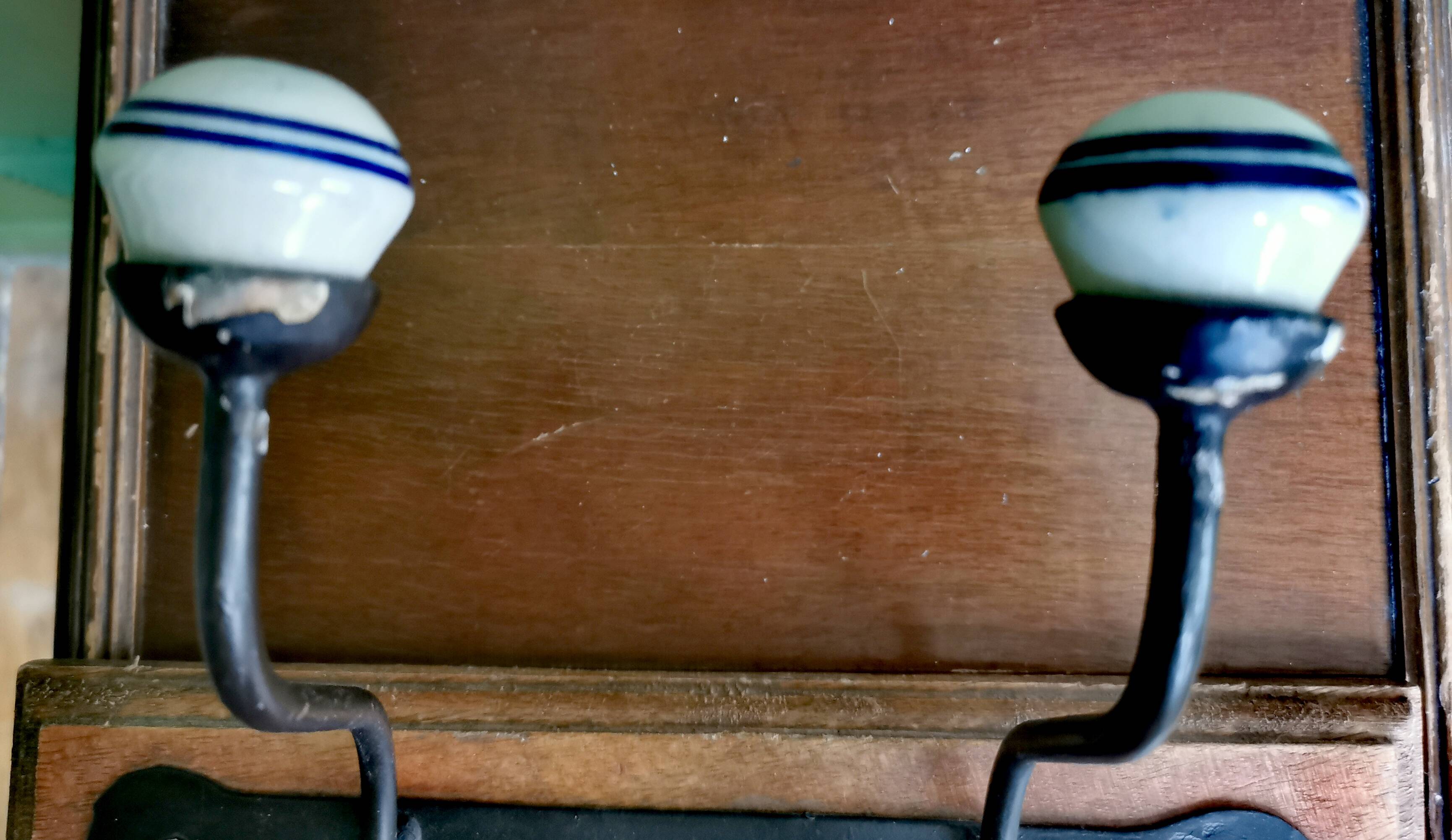 2 porcelain coat hooks