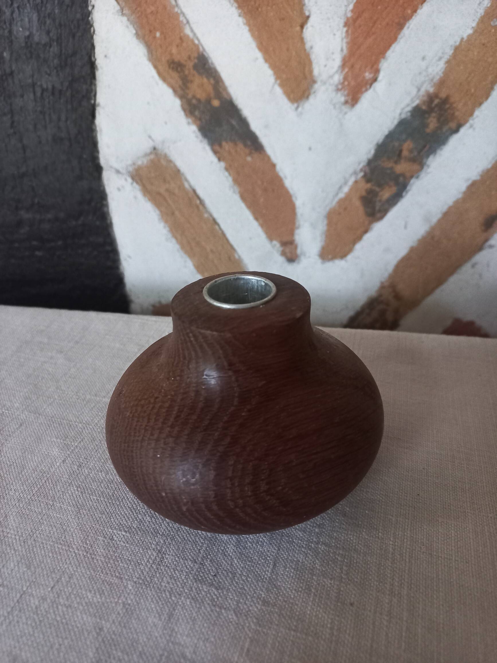 Ball shaped wooden candle holder