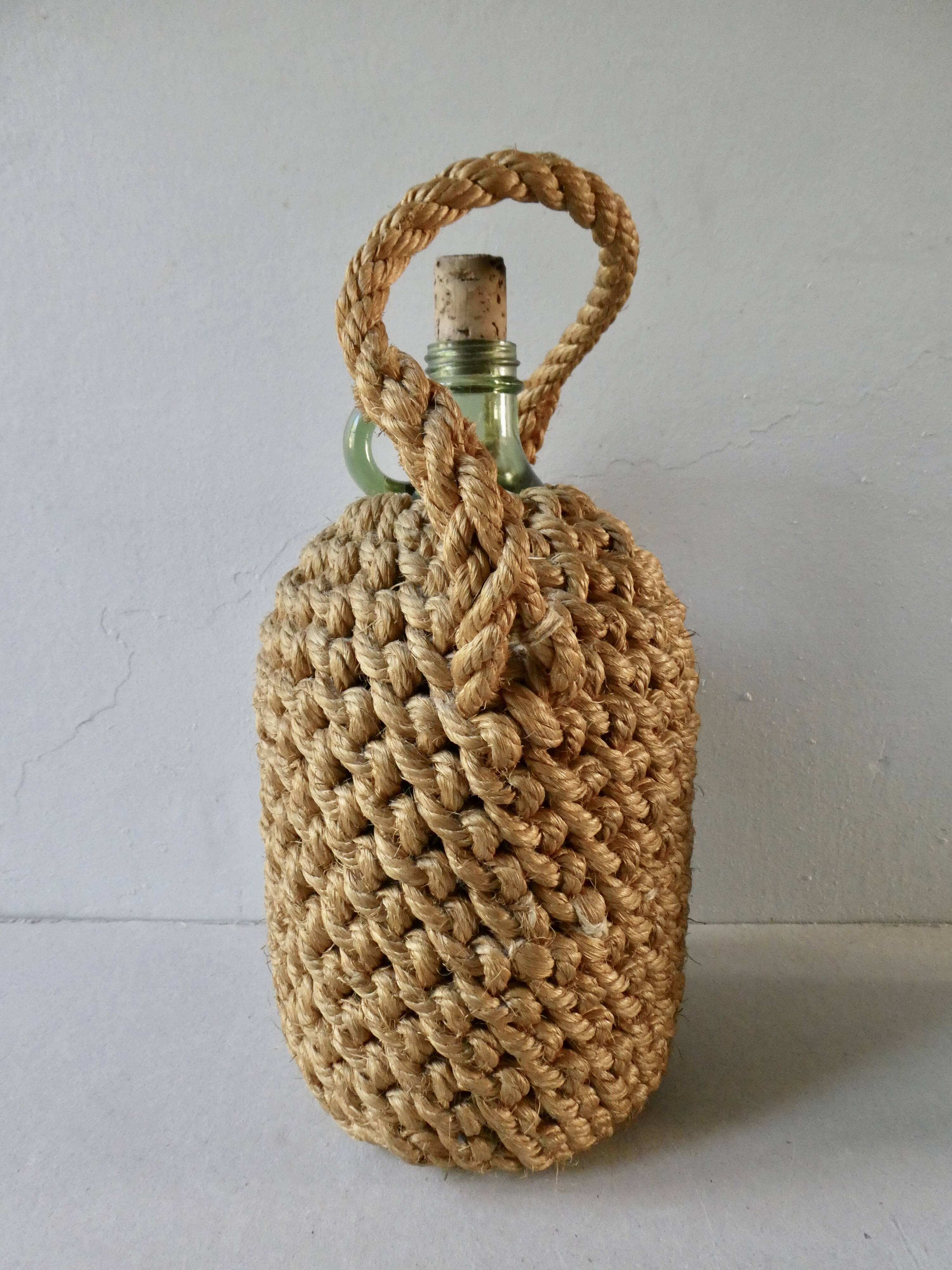 Glass bottle with braided rope, 60s