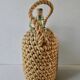 Glass bottle with braided rope, 60s