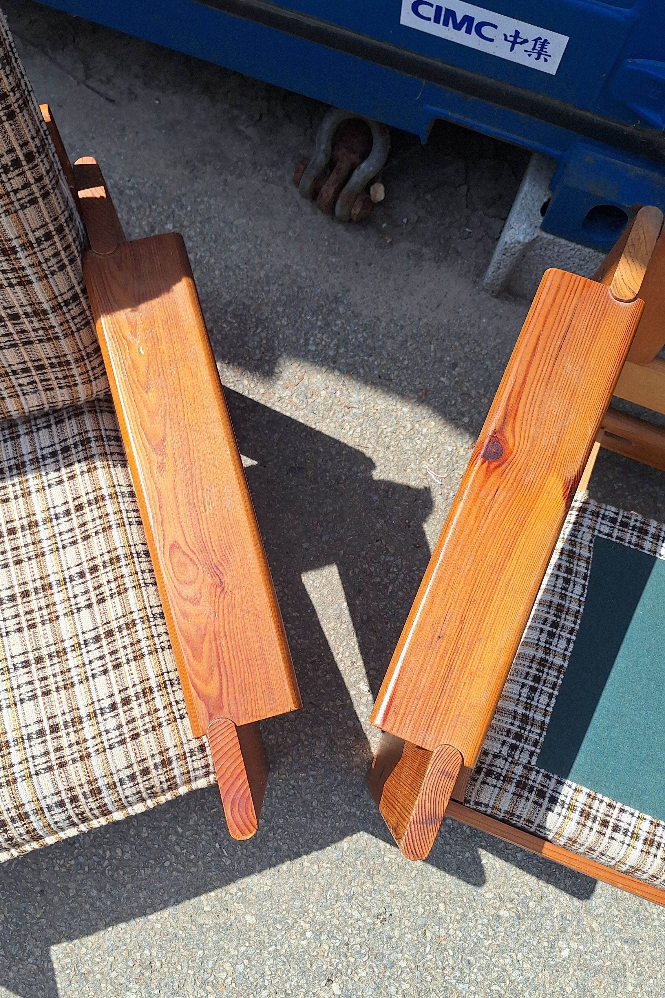 Brutalist-style bench and armchairs in 1970s pine.
