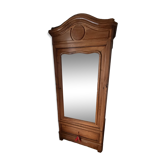 Armoire parisienne ancienne en bois massif et miroir biseauté