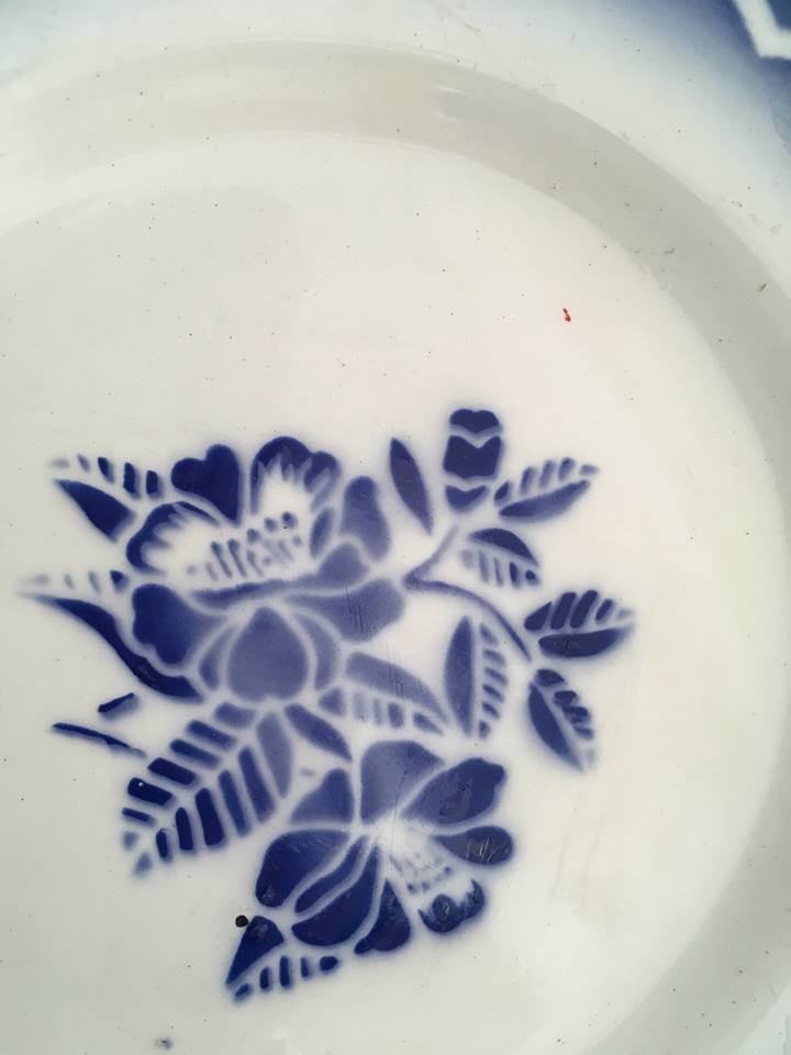 Together seven dessert plates mismatched in blue.