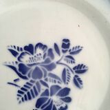 Together seven dessert plates mismatched in blue.