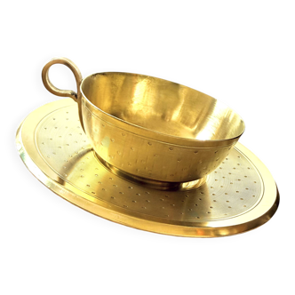 Cup and saucer in brass Saint Médard (18th century)