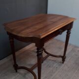 Walnut burreau table in 1900