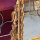 Antique mirror above a chest of drawers or between two windows, carved wood, 18th century