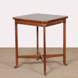 Square game table in marquetry, early 20th century