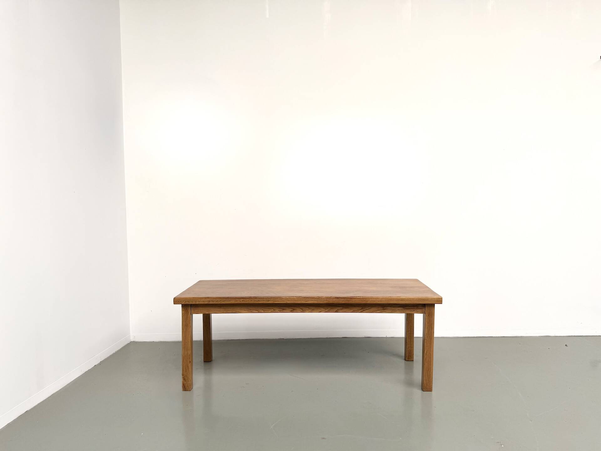 Solid oak farmhouse table, square legs.