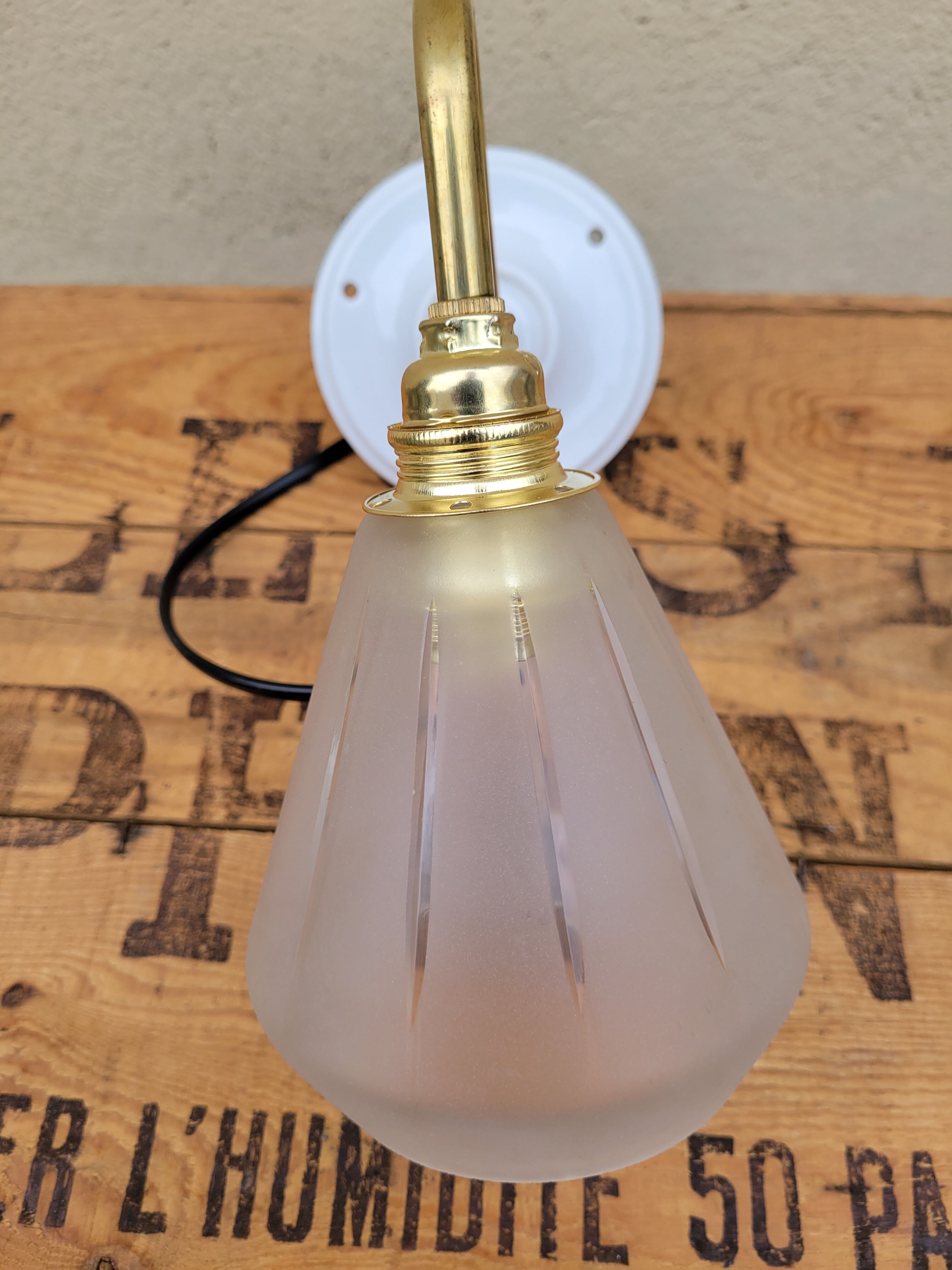Brass and frosted glass wall lamp