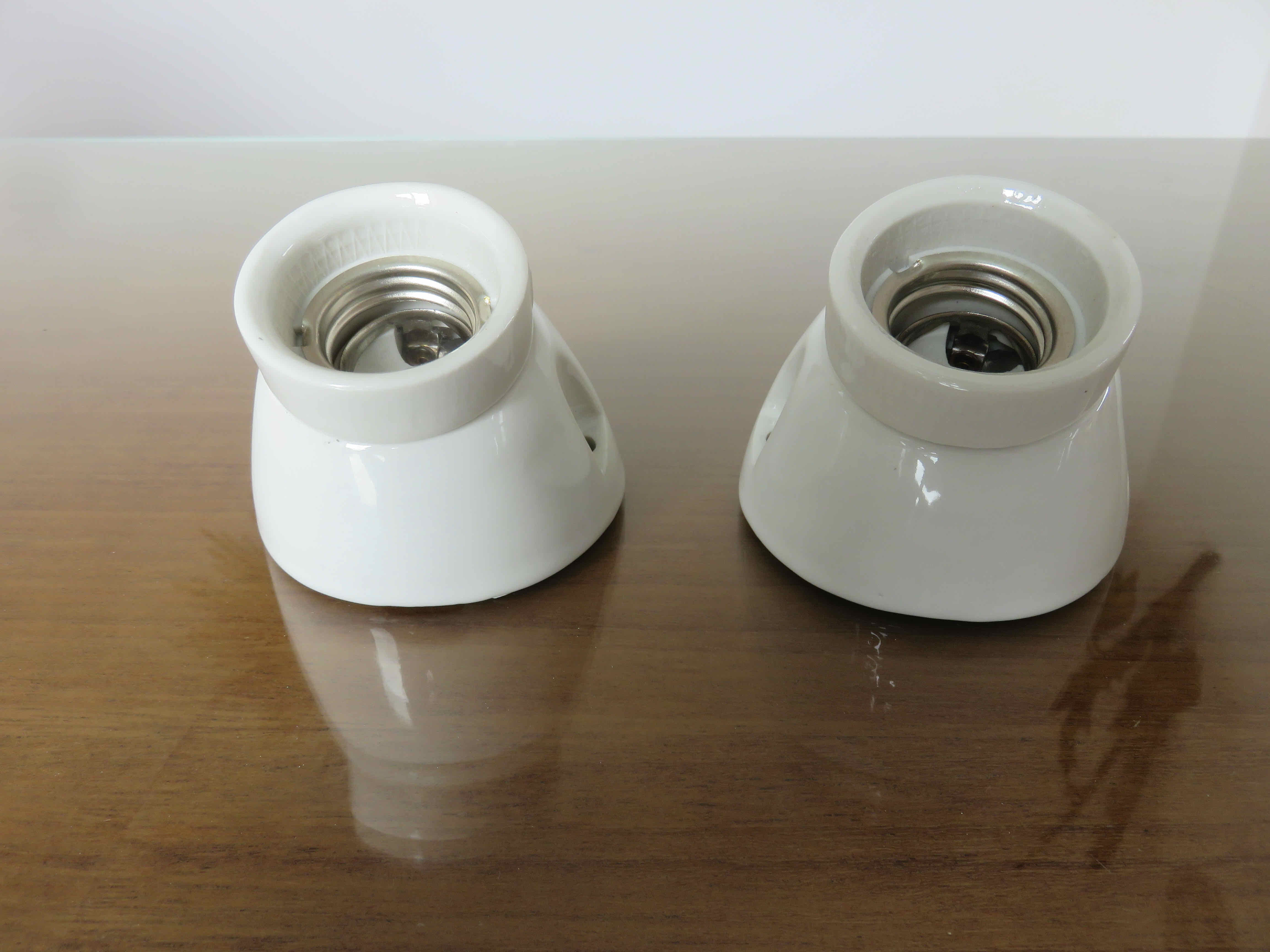 Pair of art deco style porcelain wall lamps