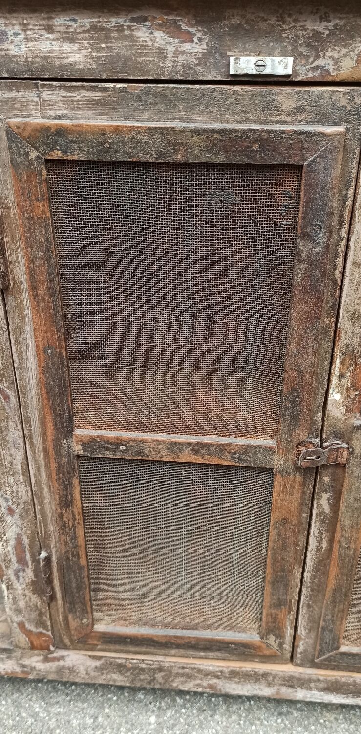 Antique wooden and metal accent furniture with mesh doors