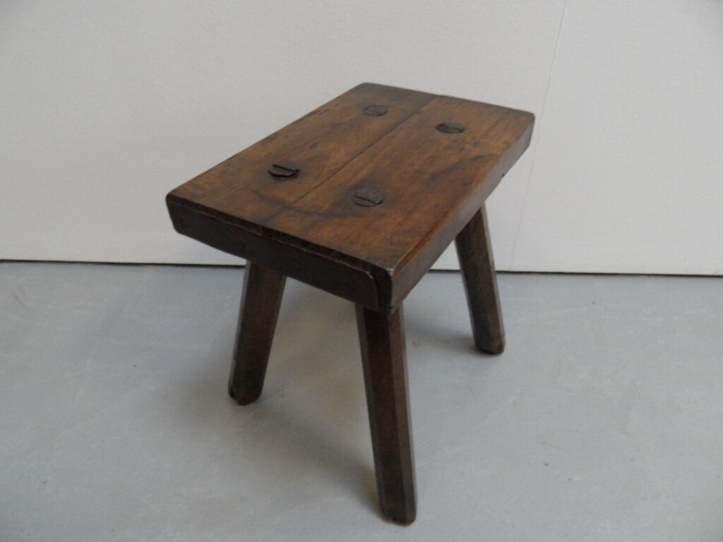 Antique milk stool