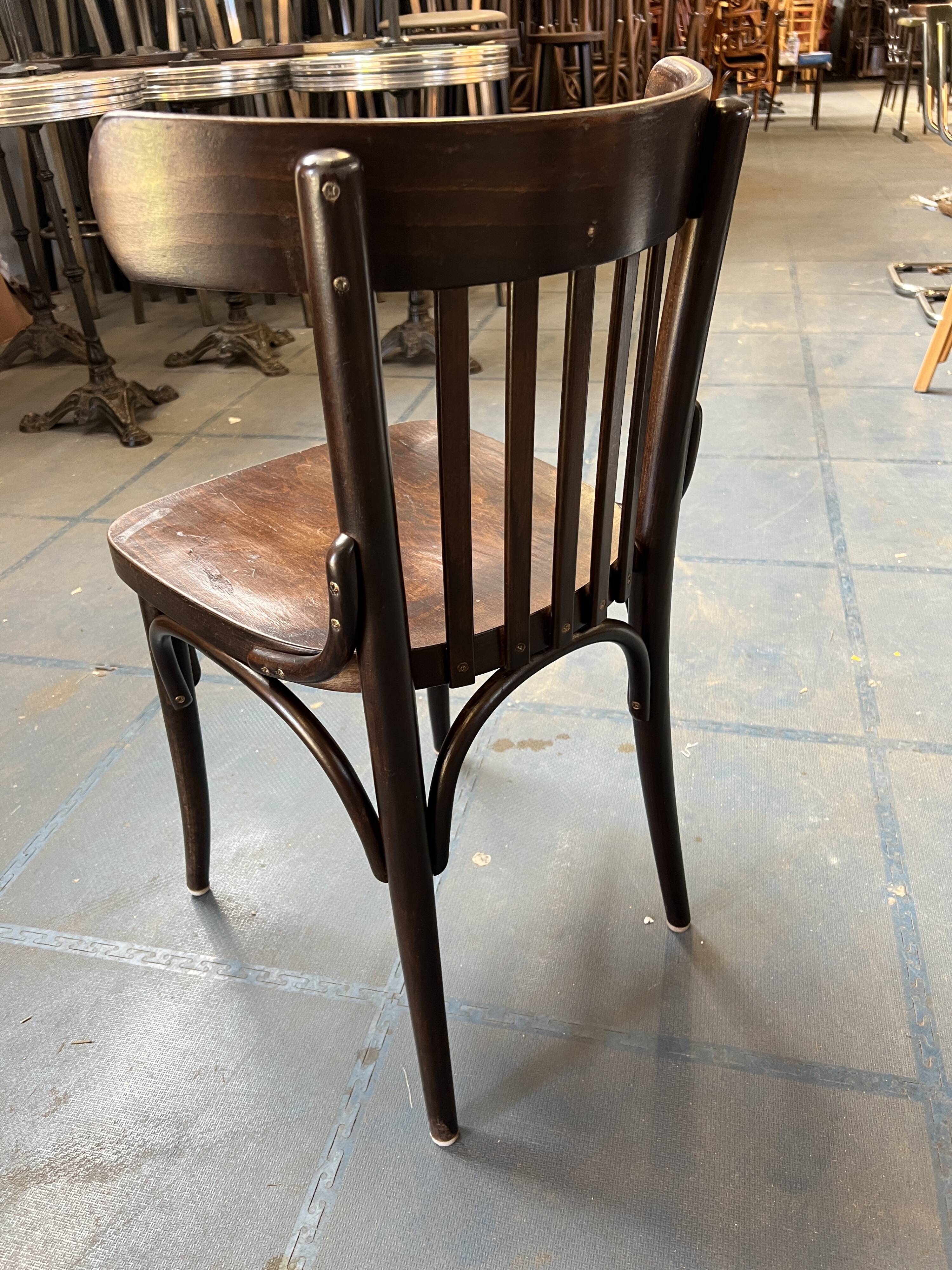 Set of 24 restored bistro chairs.