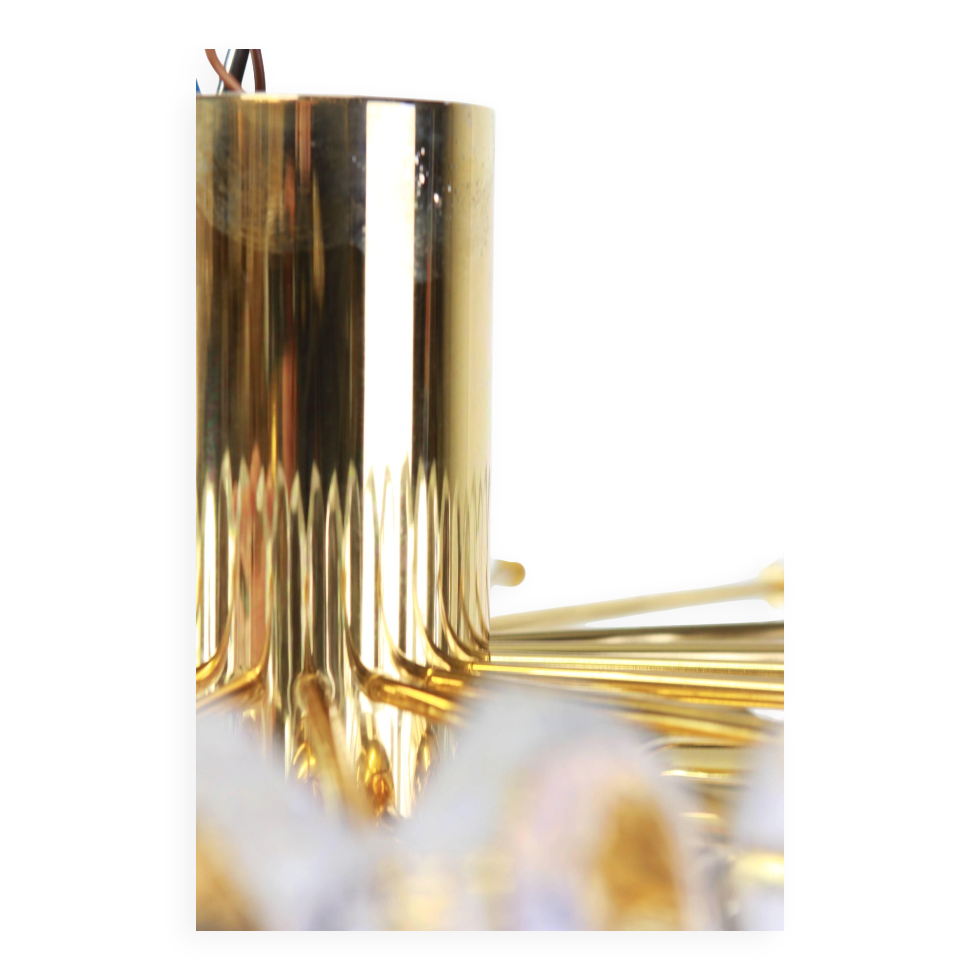 Magnificent luminaire in gilded brass and crystal glass Palazzo, Kalmar, Austria, 1970.