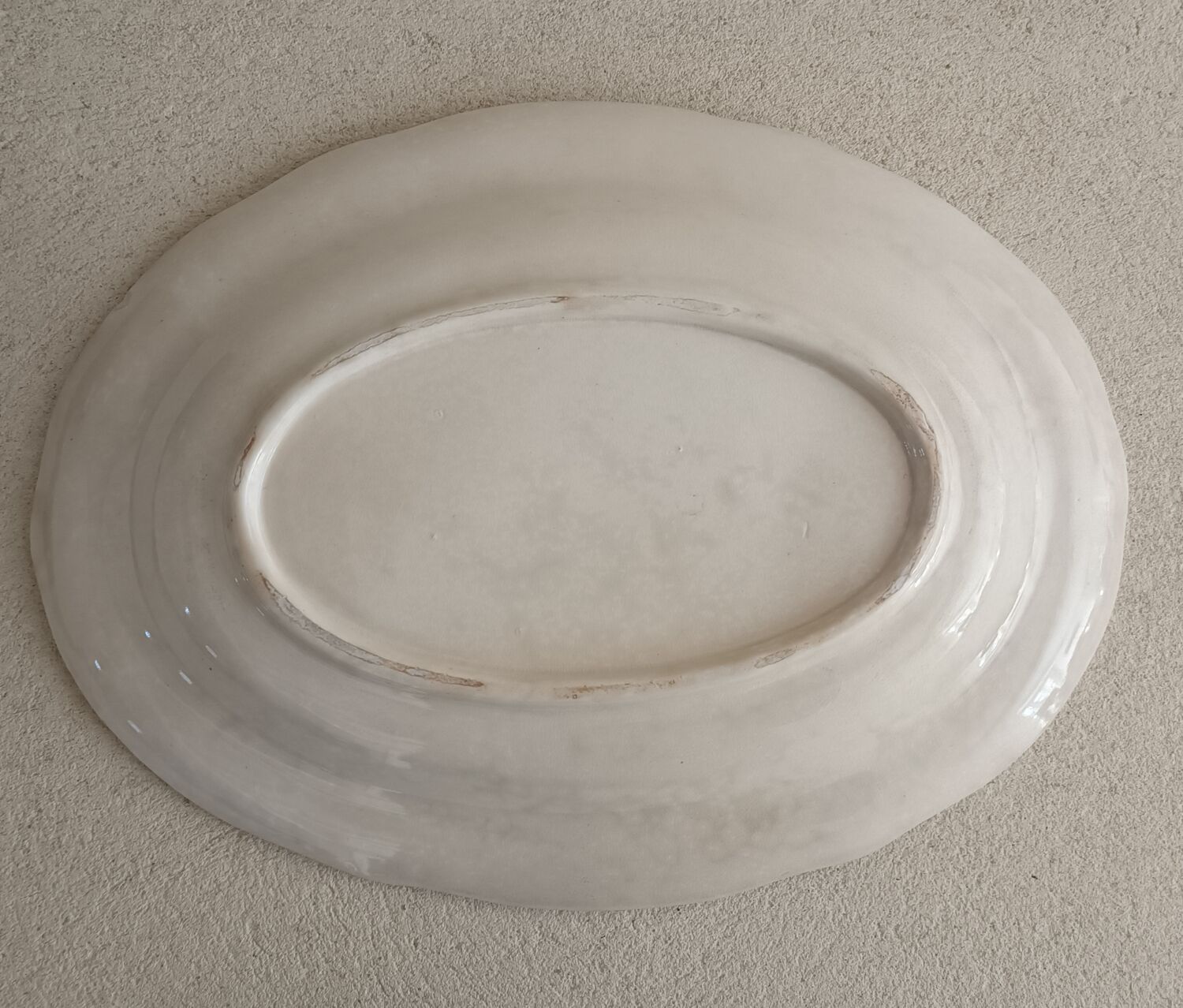 Oval iron earth dish