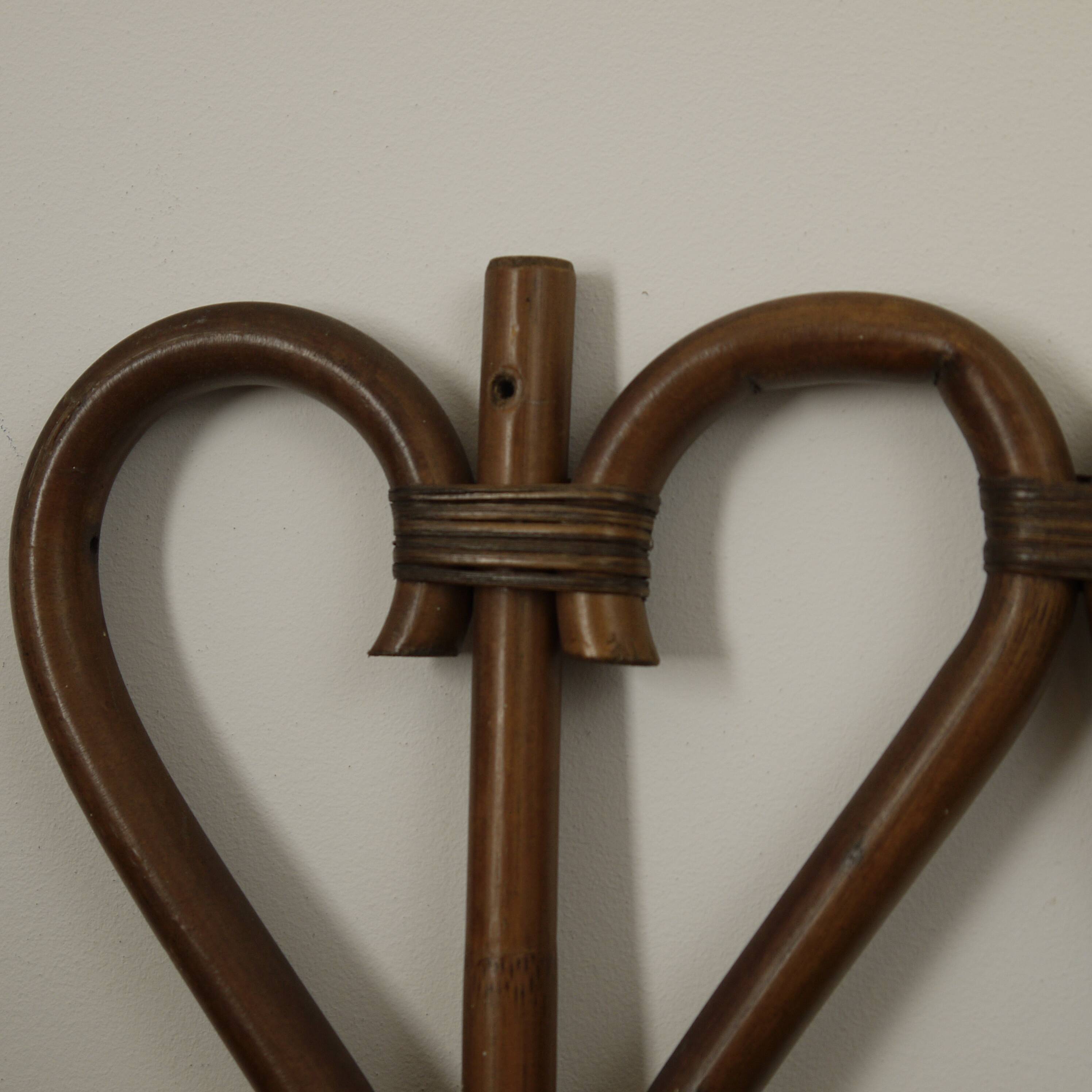 Rattan coat hanger