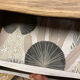 Adorable small chest of drawers or weathered white console.
