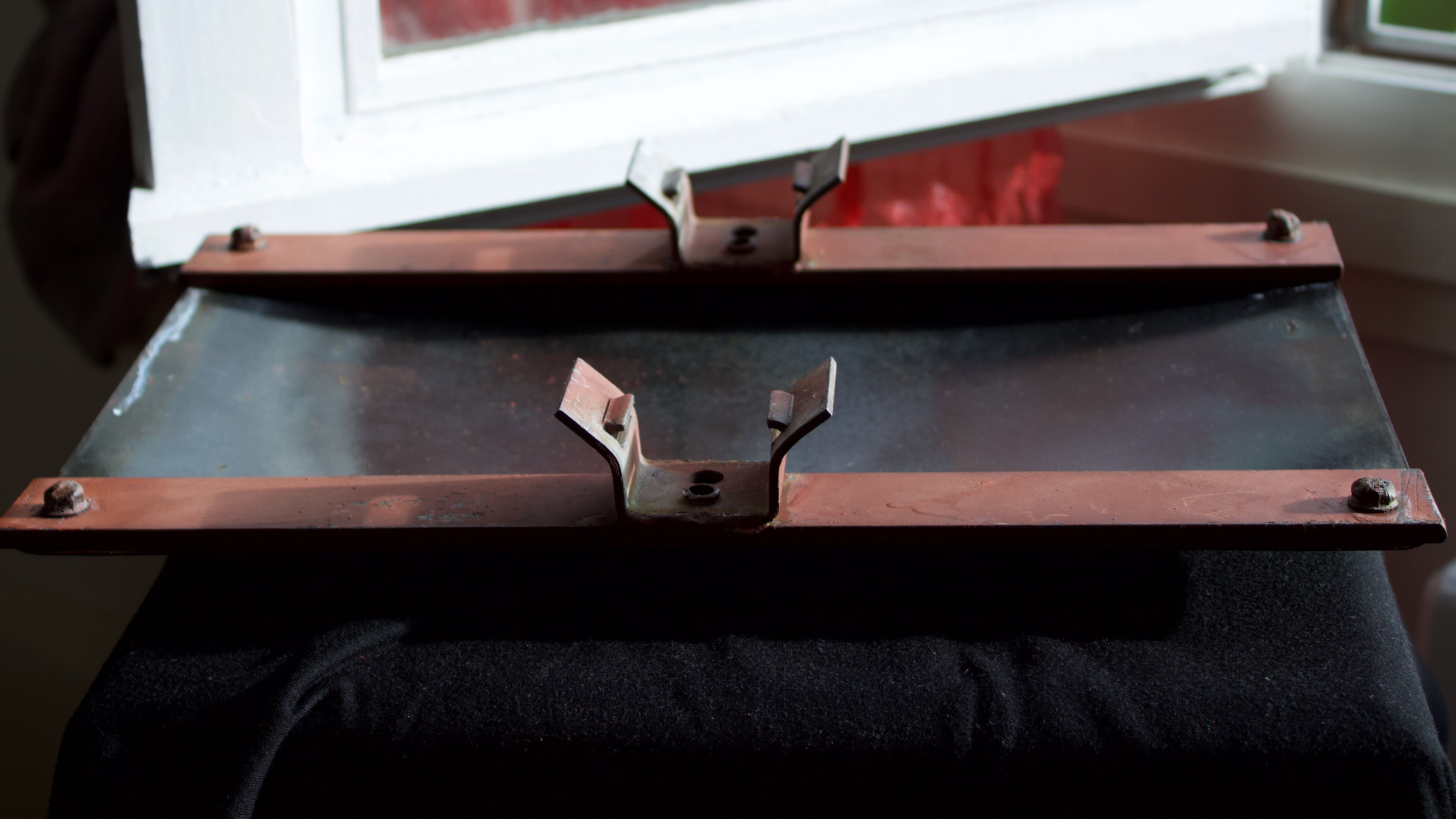 Old Enamelled and bulging "Chemin de la Rente" street plate, in perfect condition, on its cast iron support