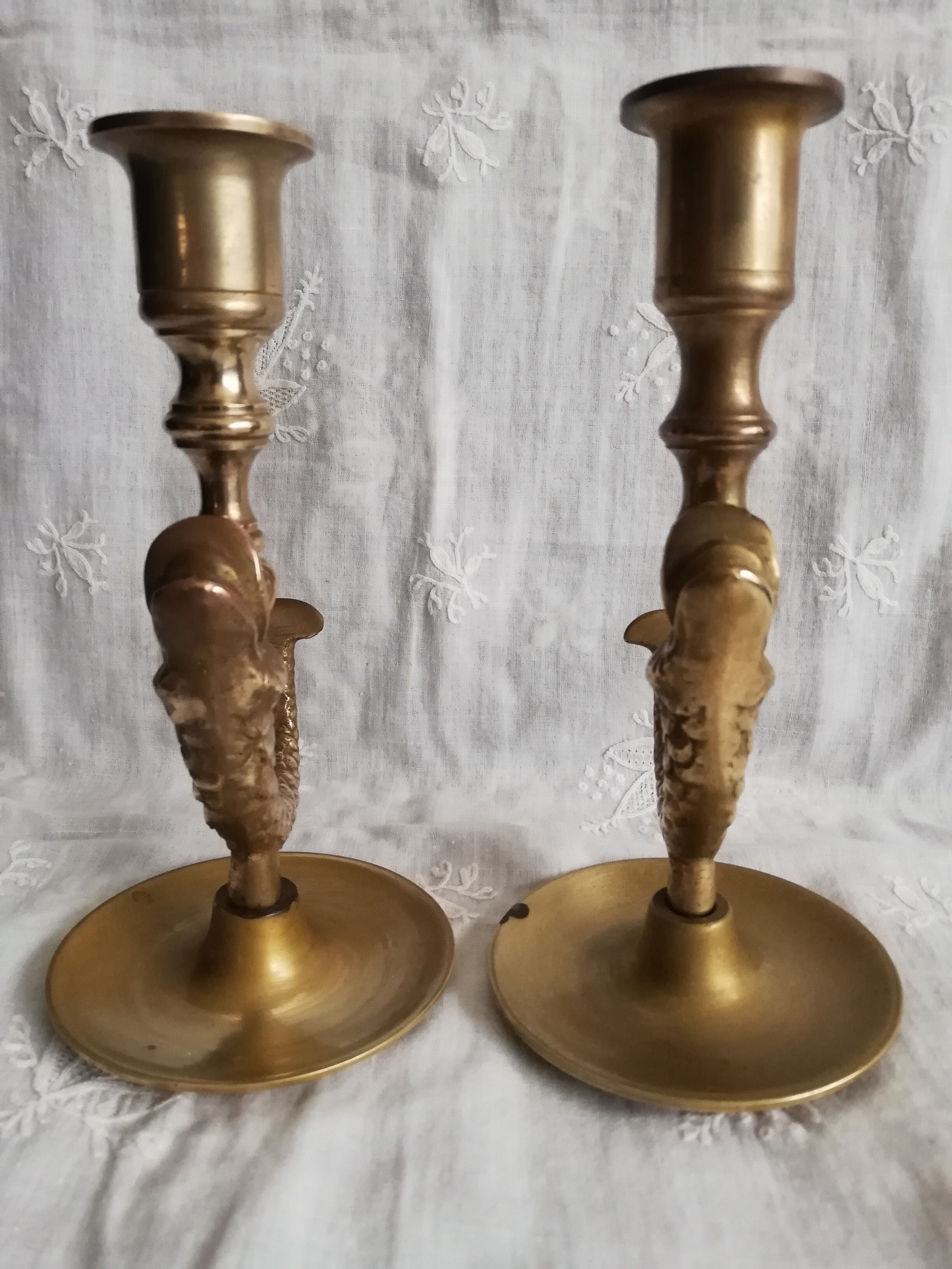 Duo brass fish candlesticks