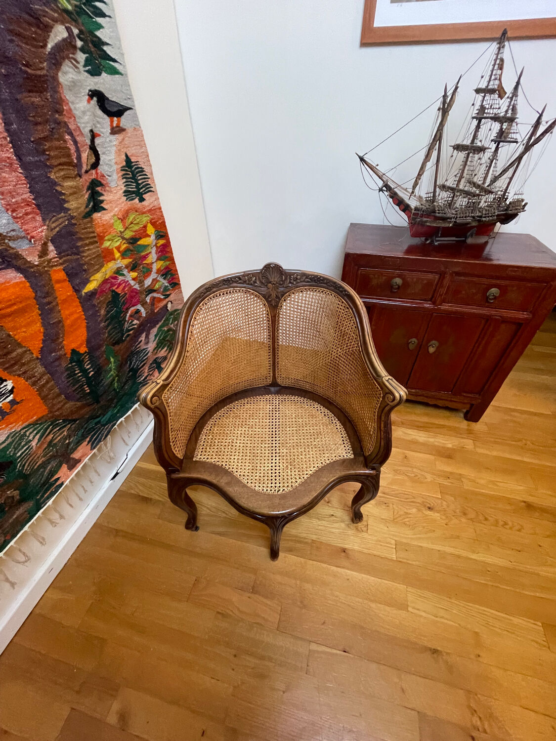 Cane seat armchair from the 19th century in the Louis XV style, known as "couillard".