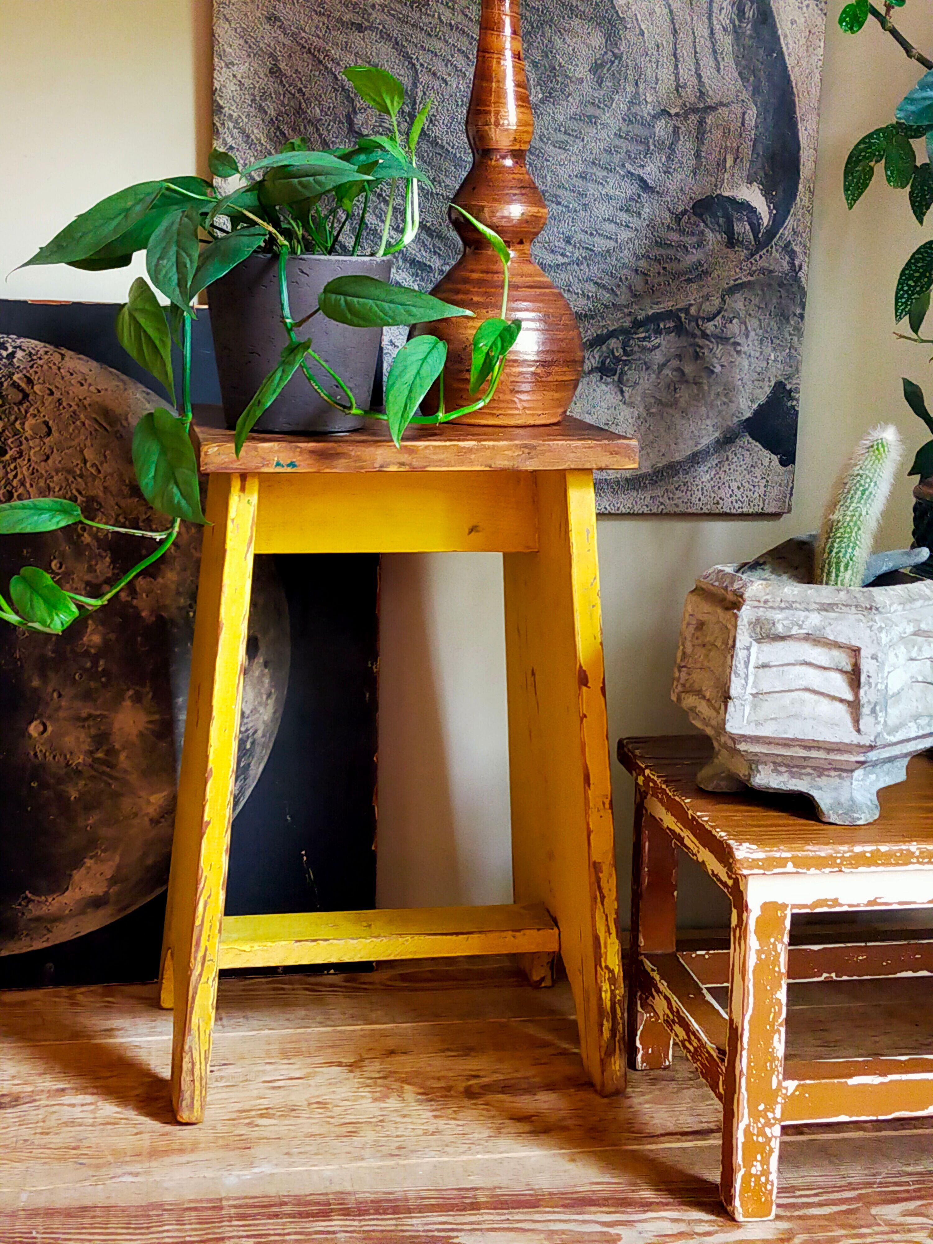 Art-populaire workshop stool in patinated wood