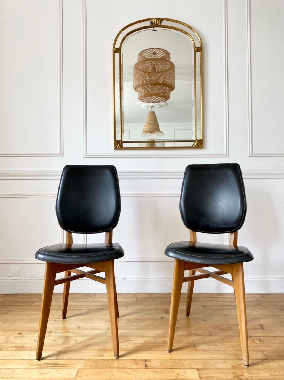 Pair of vintage wood and leather chairs
