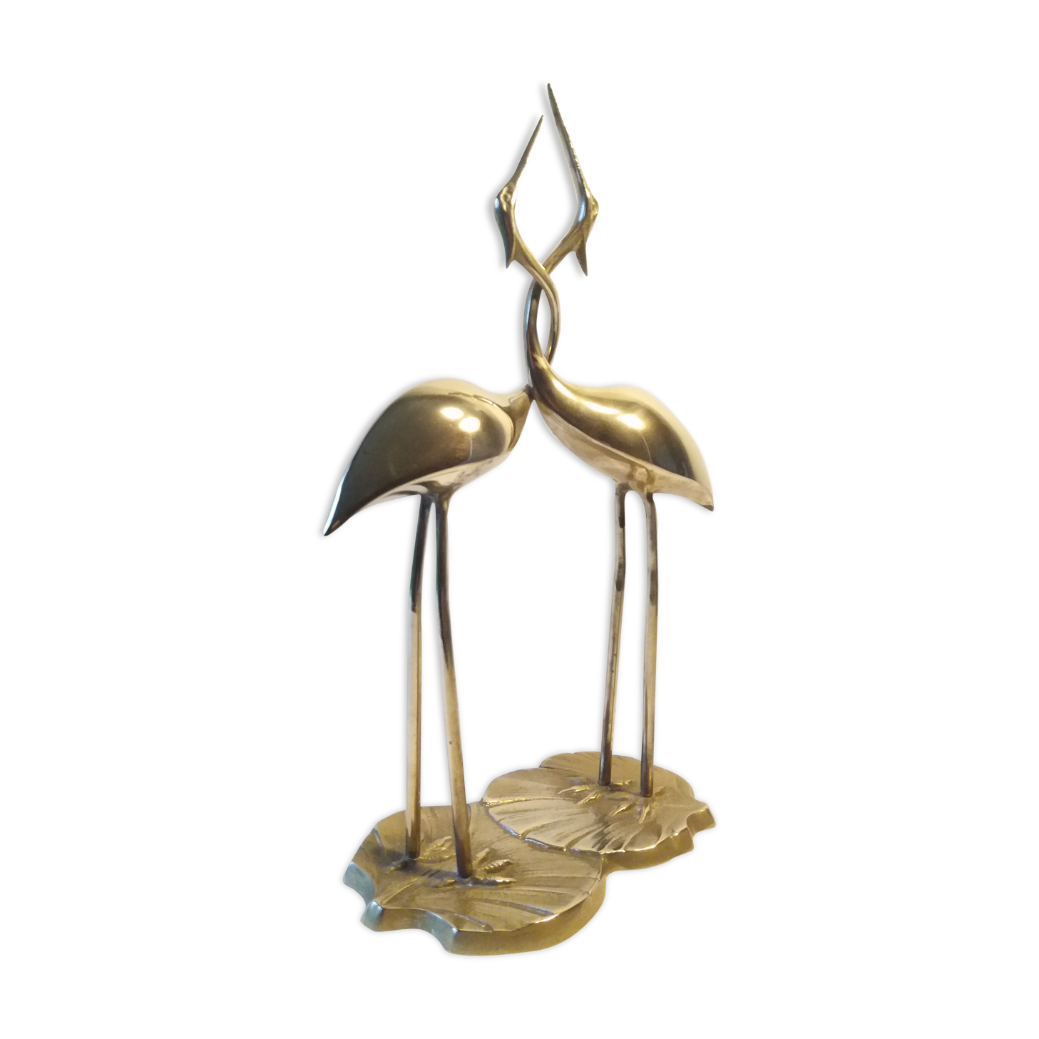 Herons entwined brass