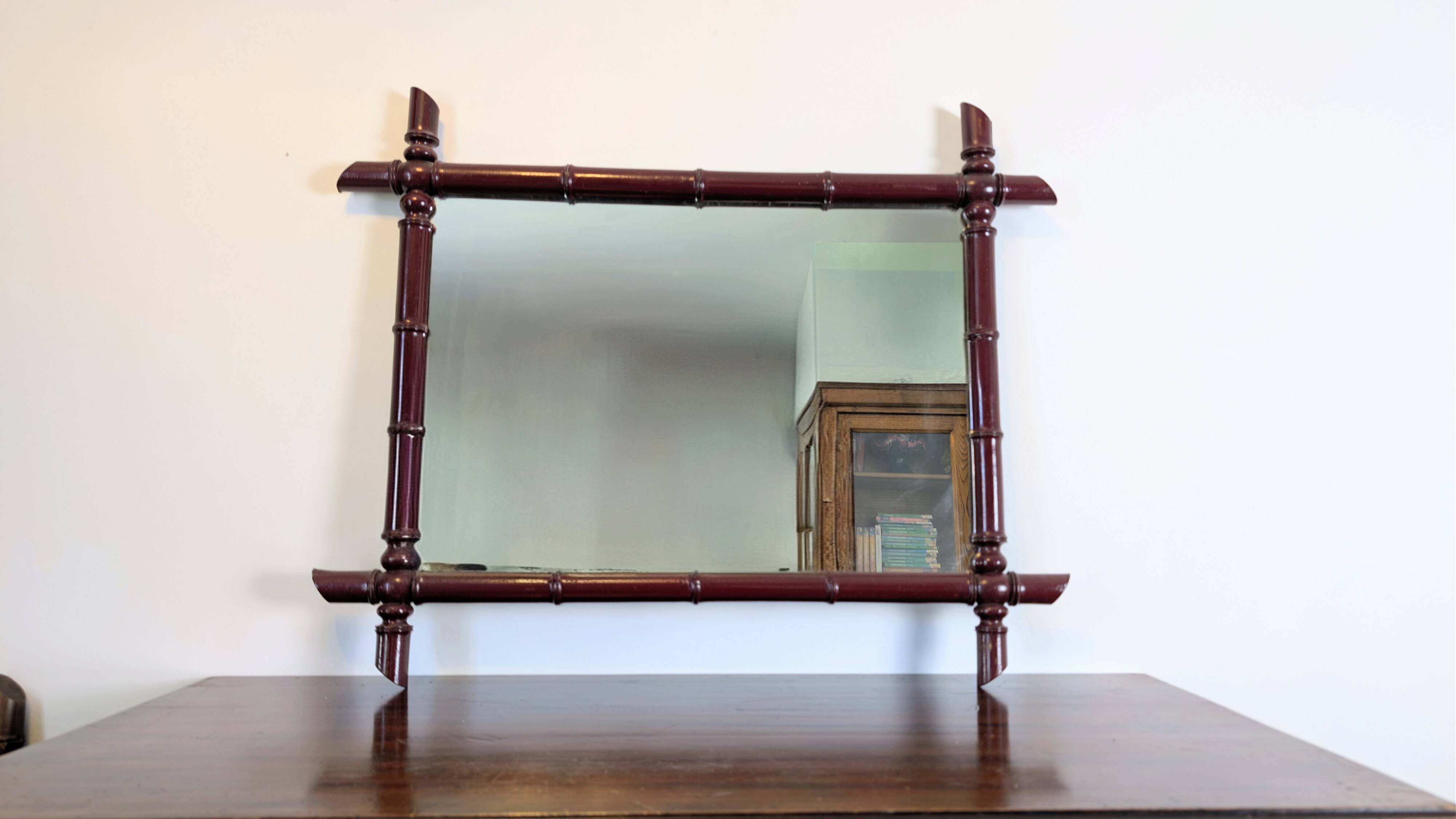 Vintage mirror with a bamboo effect in burgundy, chic exotic style - 79 x 64 cm